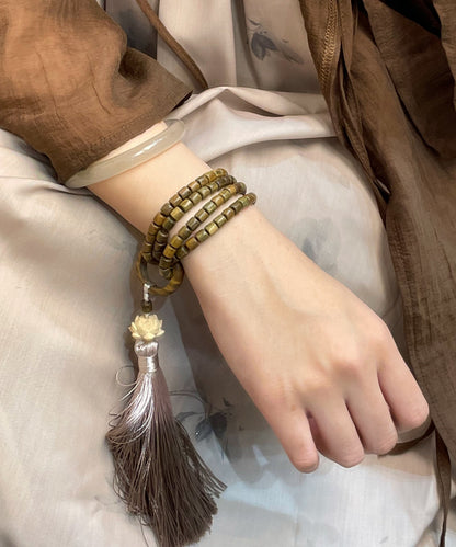 Retro Green Barrel Bead Lotus Tassel Bracelet
