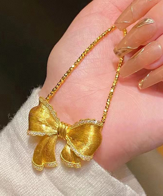 Gold Bow Zircon Pendant Necklace