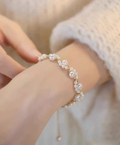 White 14k Gold Pearl Charm Bracelet