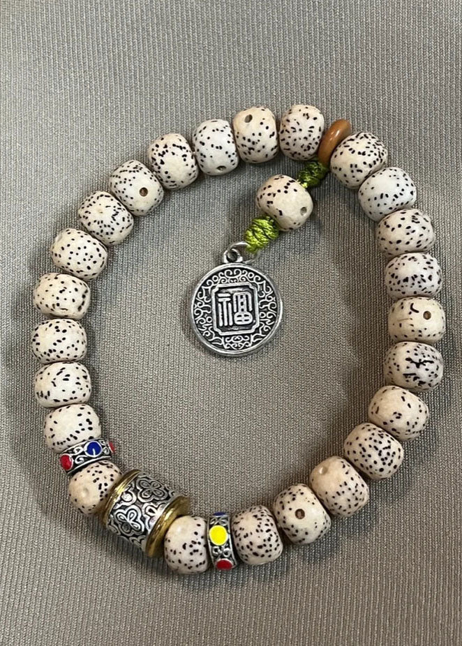 Pipal Tree Seed Fu Character Charm Bracelet