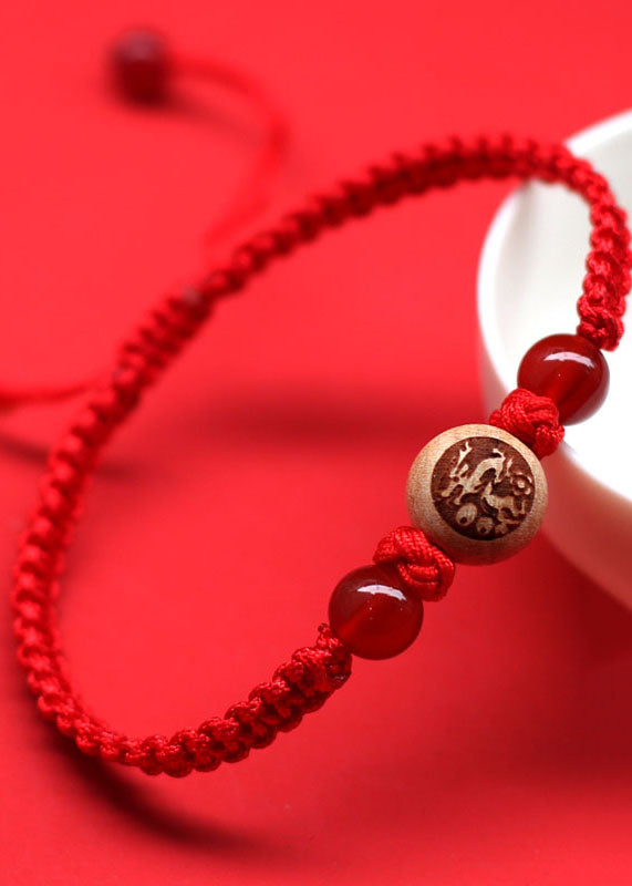 Red Hand Knitting Peach Wood Charm Bracelet