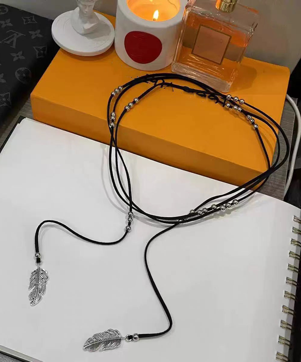 Beach Black Leather Alloy Feather Tassel Necklace