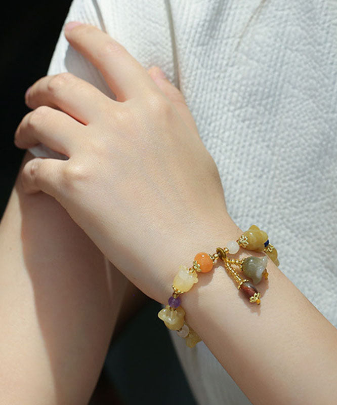 Golden Silk Jade Lily of the Rings Charm Bracelet