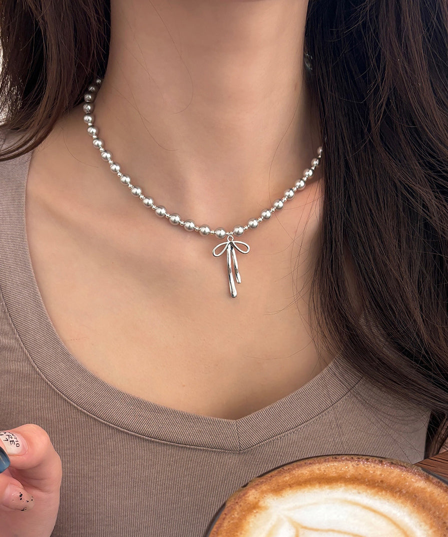 Fine Silk Stainless Steel Pearl Bow Pendant Necklace Wq029