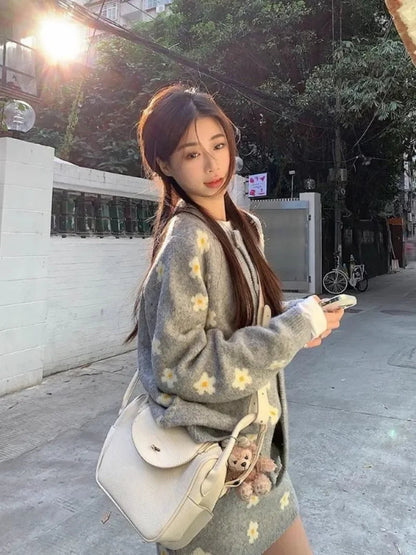 Sweet Hot Girl Knitted Suit Autumn and Winter Oneck Loose Cardigan Wrap Hip Skirt Twopiece Set Female Clothes
