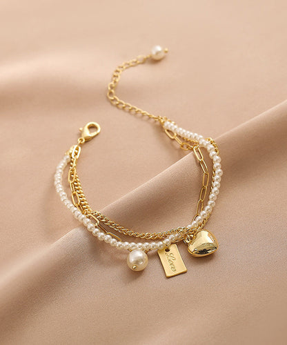 Vogue Gold Metal Alloy Pearl Graphic Love Tassel Charm Braceletfine Silk Sterling Silver Broken Silver Gypsophila Necklace Et008
