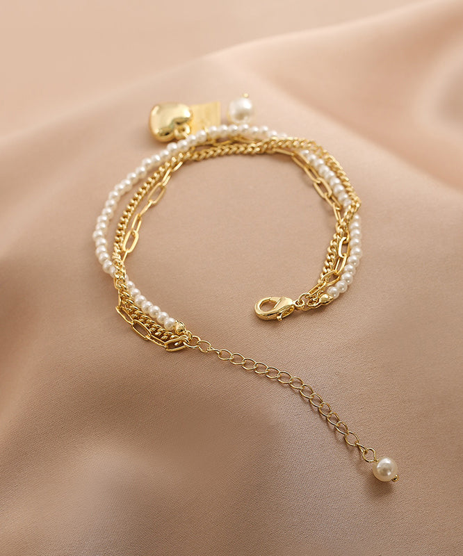 Vogue Gold Metal Alloy Pearl Graphic Love Tassel Charm Braceletfine Silk Sterling Silver Broken Silver Gypsophila Necklace Et008