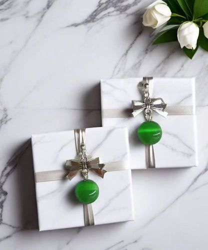 Green Copper Alloy Cat's Eye Stone Bow Drop Earrings