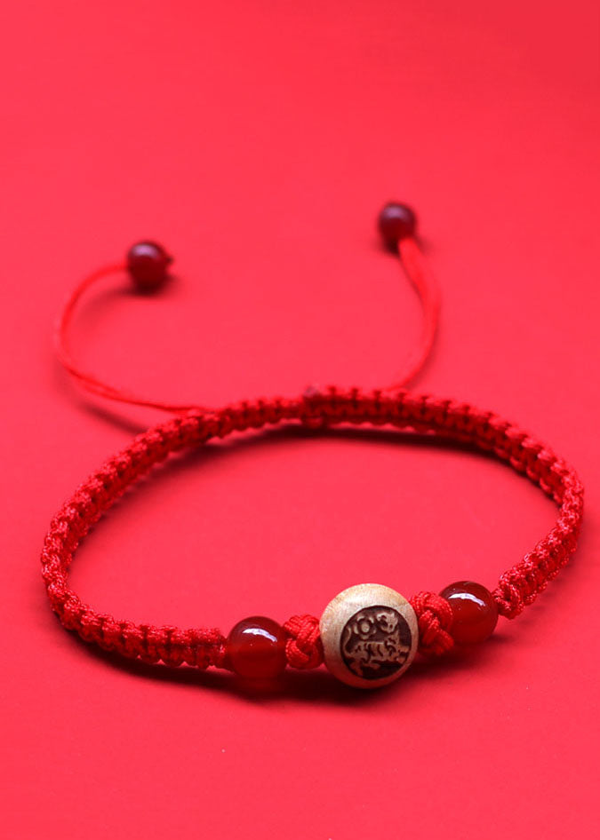 Red Hand Knitting Peach Wood Charm Bracelet