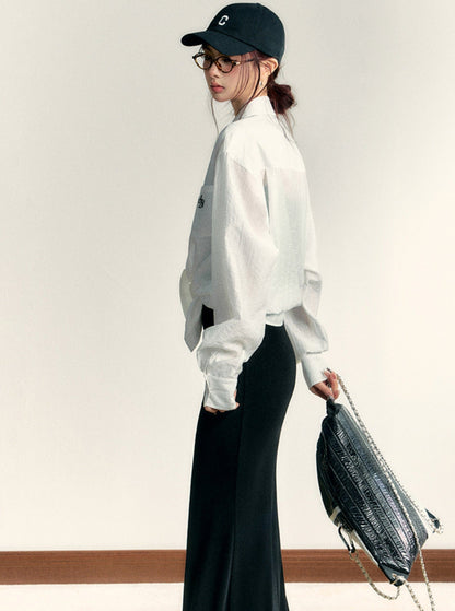 Classic White Long Sleeve Button-down Shirt: Crisp Cotton Collared Blouse With Embroidered Logo