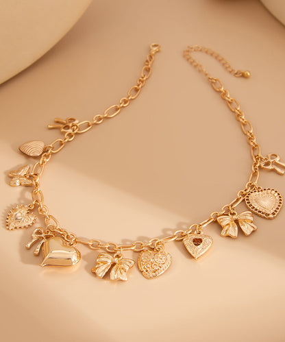 Boutique Gold Copper Alloy Love Bow Pendant Necklace