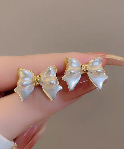 Art White Copper Alloy Bow Stud Earrings