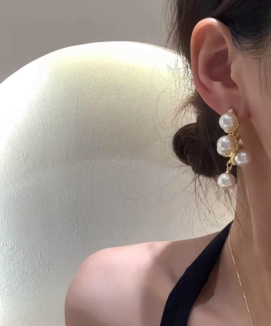 White Copper Alloy Pearl Stud Earrings