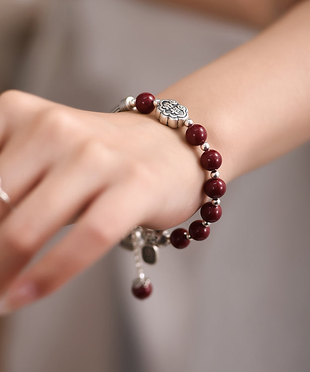 Mulberry Sterling Silver Cinnabar Tassel Charm Bracelet