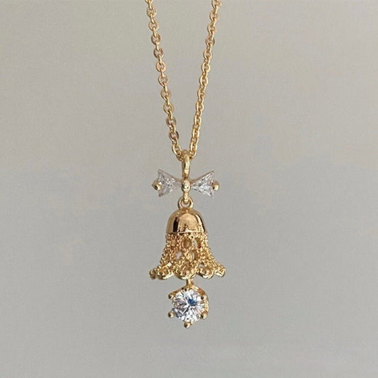 Festive Bell Clear Bow Necklace