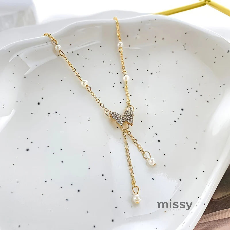 Meklit Pearl Butterfly Choker Necklace