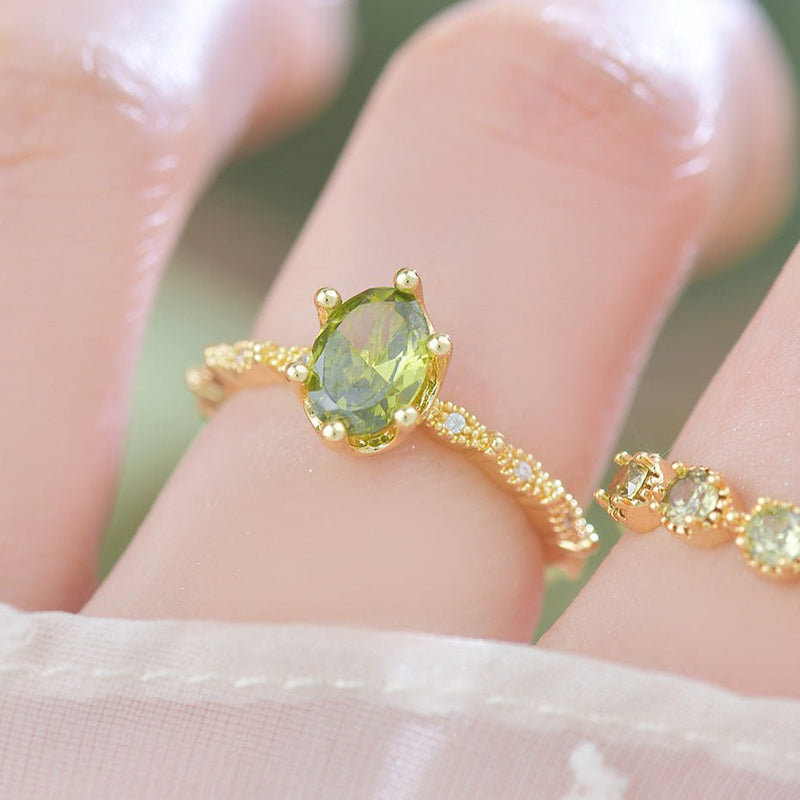 Oval Peridot Ring in Gold