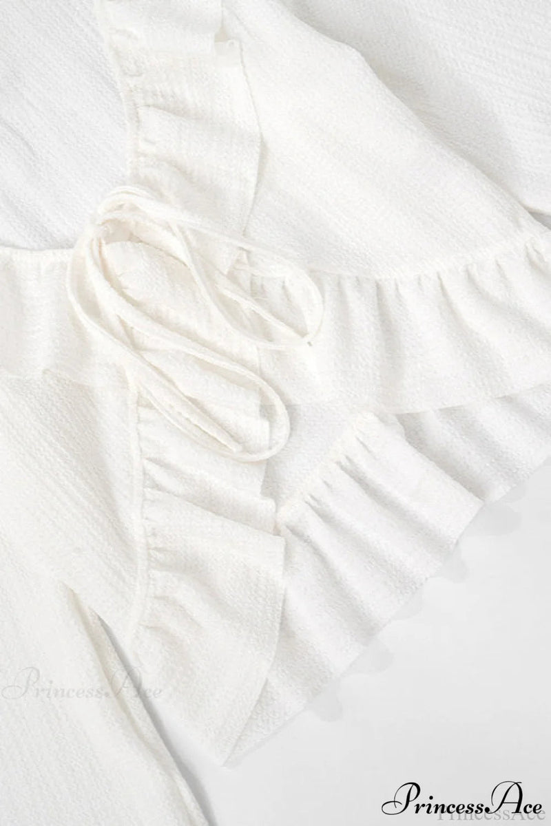 Color Ruffled Tie Long Sleeve Blouse